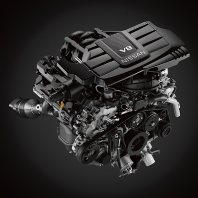 2024 Nissan TITAN 400 horsepower Endurance V8 engine against a black background