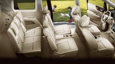 Nissan Quest® Platinum shown in Beige Leather, highlighting 3 rows of spacious seating.