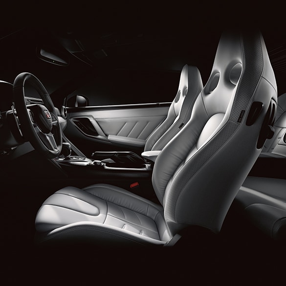2024 Nissan GT-R interior view of front seats with premium seating appointments.