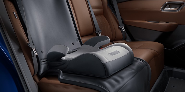 2024 Nissan Rogue interior view showing installed child seat