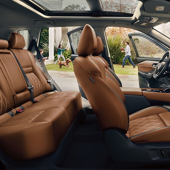 2024 Nissan Rogue interior view of seating with far doors open
