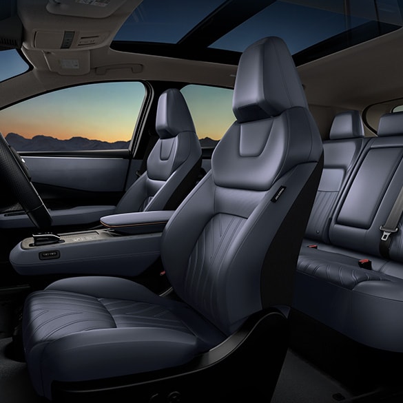 2024 Nissan Ariya interior showing front and back seats to illustrate lounge like space