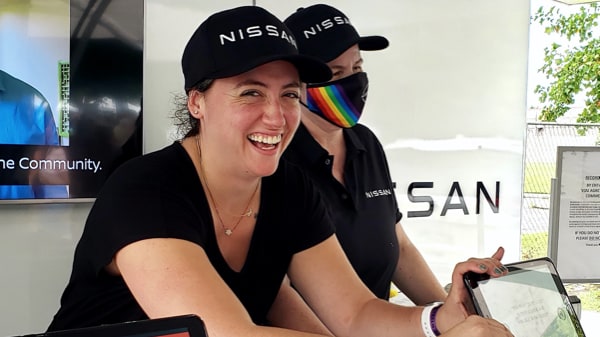 Woman Smiling at Nissan Pride Event