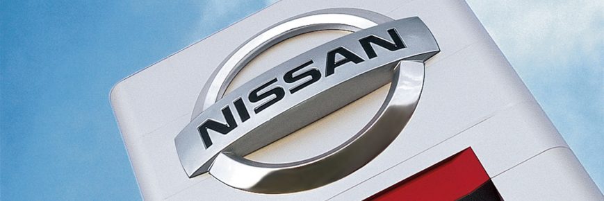 Nissan Sign And Logo At A Local Dealership