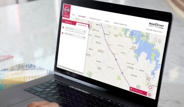 Laptop displaying map and directions using NissanConnect journey planner
