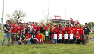 Nissan volunteers celebrate 5000th tree planted, Nissan Stadium