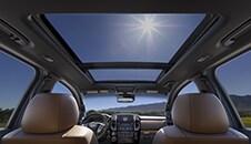 2021 Nissan TITAN view from backseat in day time with dual panoramic moonroof and sun shining in