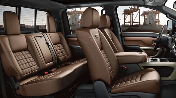 2023 Nissan TITAN showing crew cab seating and interior.