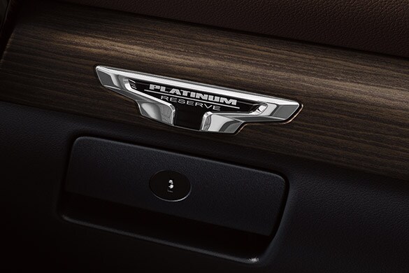 2023 Nissan TITAN platinum reserve interior with badge.