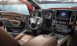 2023 Nissan TITAN heated leather-wrapped steering wheel.