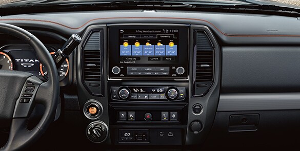 2023 Nissan TITAN Pro-4x integrated command center with NissanConnect color 9-inch touch-screen display.
