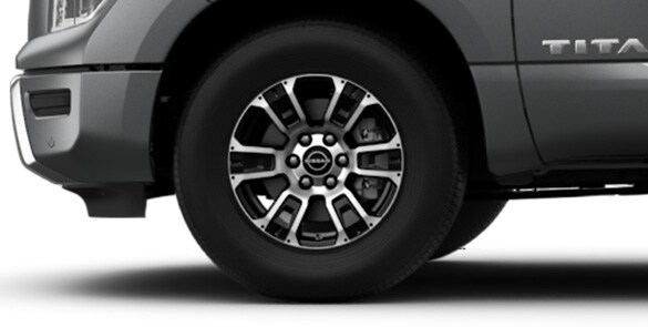 2023 Nissan TITAN King Cab SV 18-inch dark-painted machine-finished aluminum-alloy wheels.