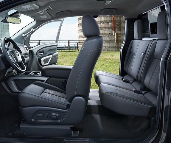 2024 Nissan TITAN interior with passenger door open