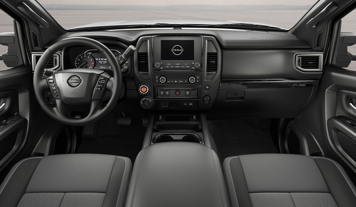 2024 Nissan TITAN Midnight Edition interior front seats, console, gauges and touch screen