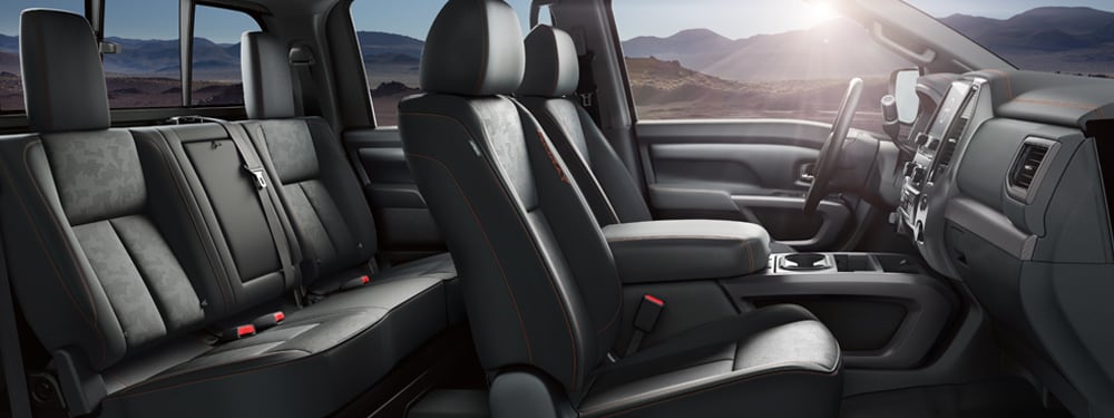  2024 Nissan Titan black leather interior side view