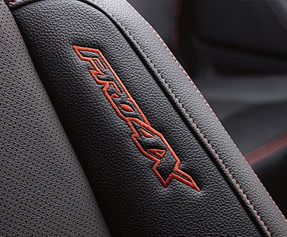 2024 Nissan TITAN PRO-4X closeup of logo on seat