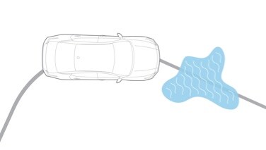 2022 Nissan Altima overhead illustration of car driving straight through ice patch using traction control system.