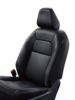 2022 Nissan Altima deeply bolstered driver's seat on white background.
