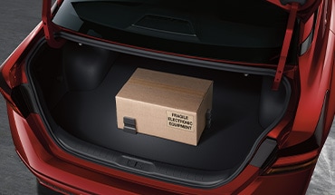 2023 Nissan Altima cargo blocks holding a package steady in the trunk.