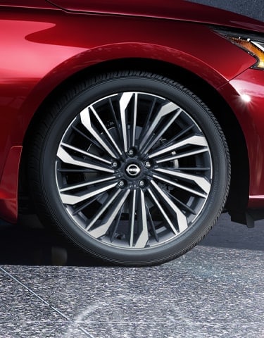 2024 Nissan Altima close up showing 19″ machine-finished aluminum-alloy wheels
