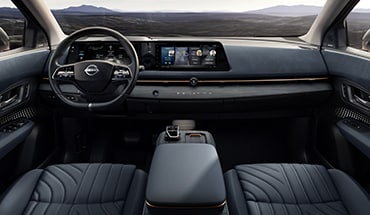 2023 Nissan Ariya interior showing front seats, console, and 12-inch display