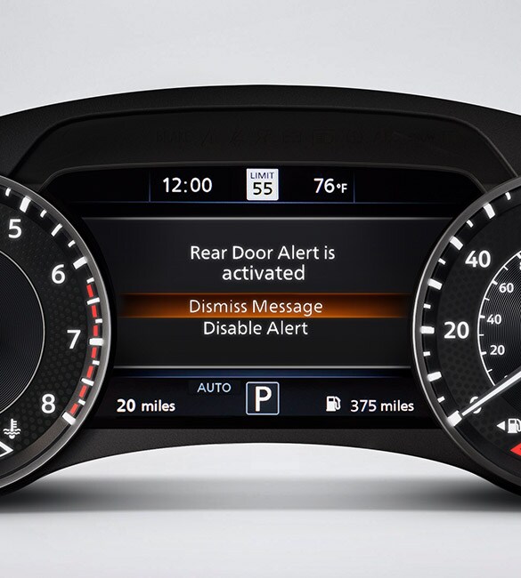 2022 Nissan Armada gauge screen showing rear door alert.