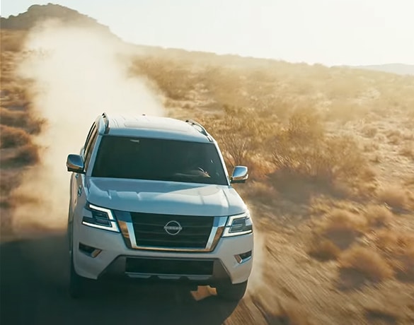 2023 Nissan Armada driving off-road in the desert.