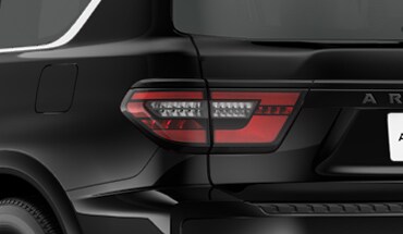 2023 Nissan Armada rear view showing taillights with black surround.