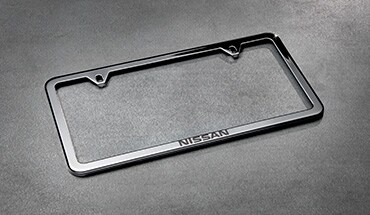 2022 Nissan Frontier Nissan polished aluminum license plate frame.