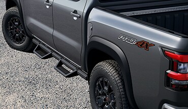 2022 Nissan Frontier off-road style step rails.