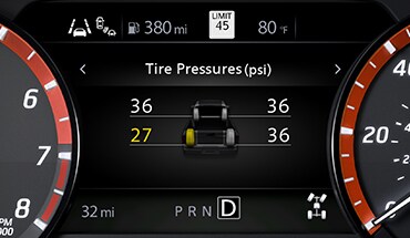 2022 Nissan Frontier gauge screen showing tire pressure monitoring system with easy-fill tire alert.