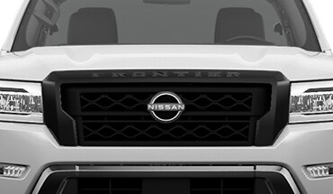 2023 Nissan Frontier eye-catching black grille.