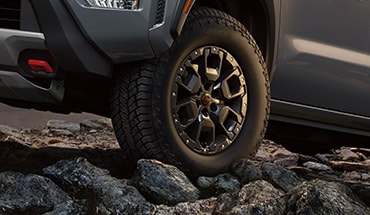2023 Nissan Frontier close up of all-terrain tire.