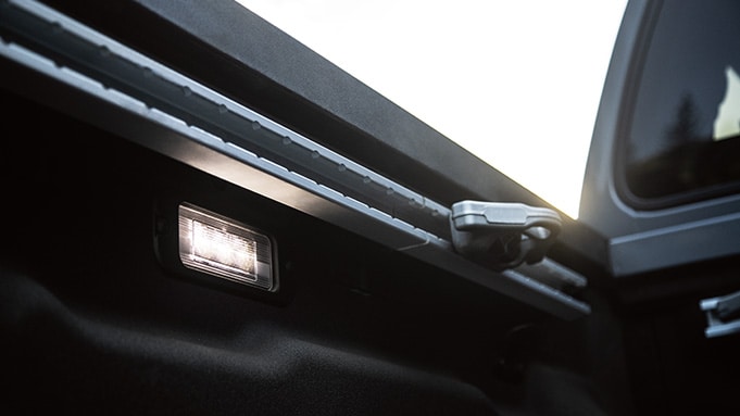 2024 Nissan Frontier detail view of bed lighting