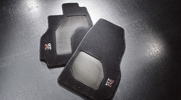 2023 Nissan GT-R premium sport floor mats w/ carbon fiber inserts (2-piece set).