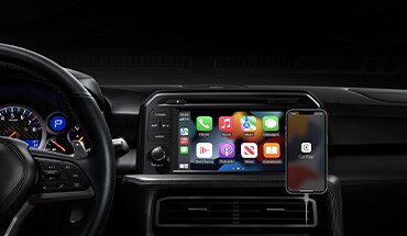 2023 Nissan GT-R touch-screen showing Apple CarPlay® app icons.
