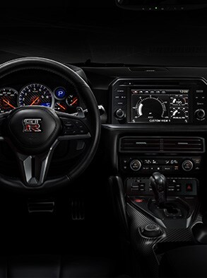 2023 Nissan GT-R cockpit view showing multi-function display system.