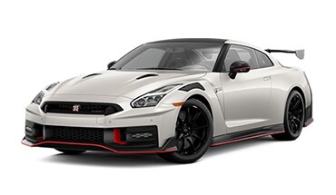 2024 Nissan GT-R in Pearl White TriCoat, 3/4 front profile view.