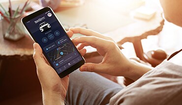 2022 Nissan Kicks smartphone with Nissanconnect app open illustrating remote access