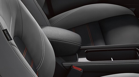 2022 Nissan Kicks interior view of center armrest with storage