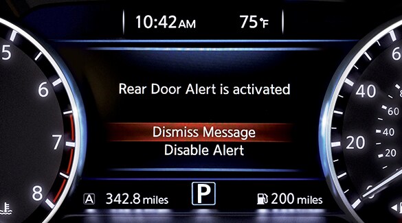 2022 Nissan Kicks gauge display showing rear door alert message
