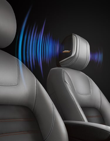 2024 Nissan Kicks front seat illustrating Bose® speakers in headrest