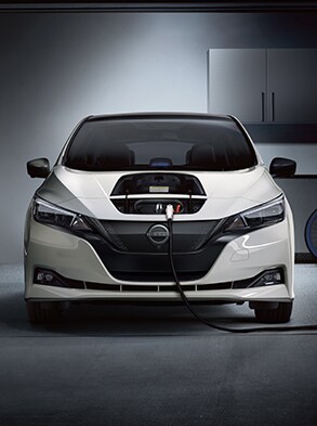 2023 Nissan LEAF being charged in a home garage