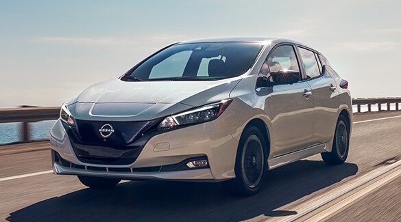 2024 Nissan LEAF driving swiftly on highway