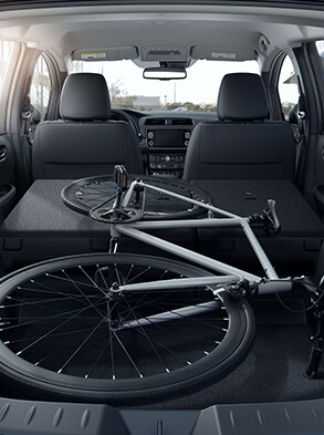 2024 Nissan LEAF interior showing cargo space with bicycle