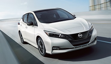 2024 Nissan LEAF in white on a highway daytime