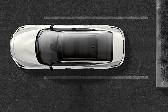 2023 Nissan Maxima Platinum seen from directly above backing into a parking space using Nissan Intelligent Mobility.