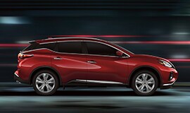 2022 Nissan Murano in profile at night showing floating roof design