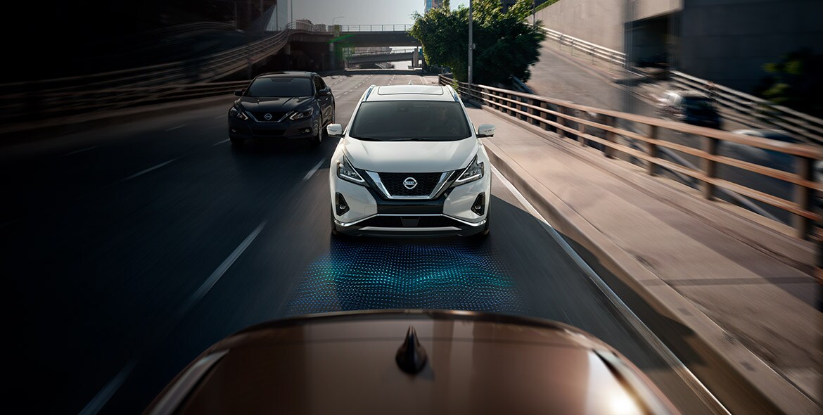 2022 Nissan Murano on the road showing automatic emergency braking with pedestrian detection sensors