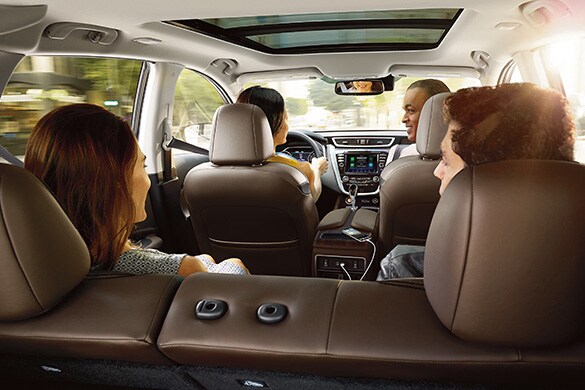 2023 Nissan Murano interior seen from the back will 4 people in the car.